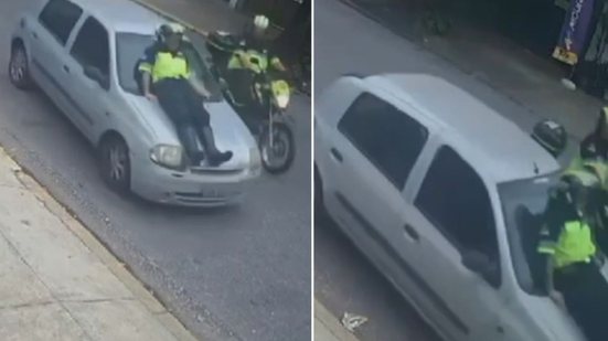 Imagens capturadas por câmeras locais mostram a servidora sendo carregada pelo automóvel em movimento - Imagem: Reprodução/g1